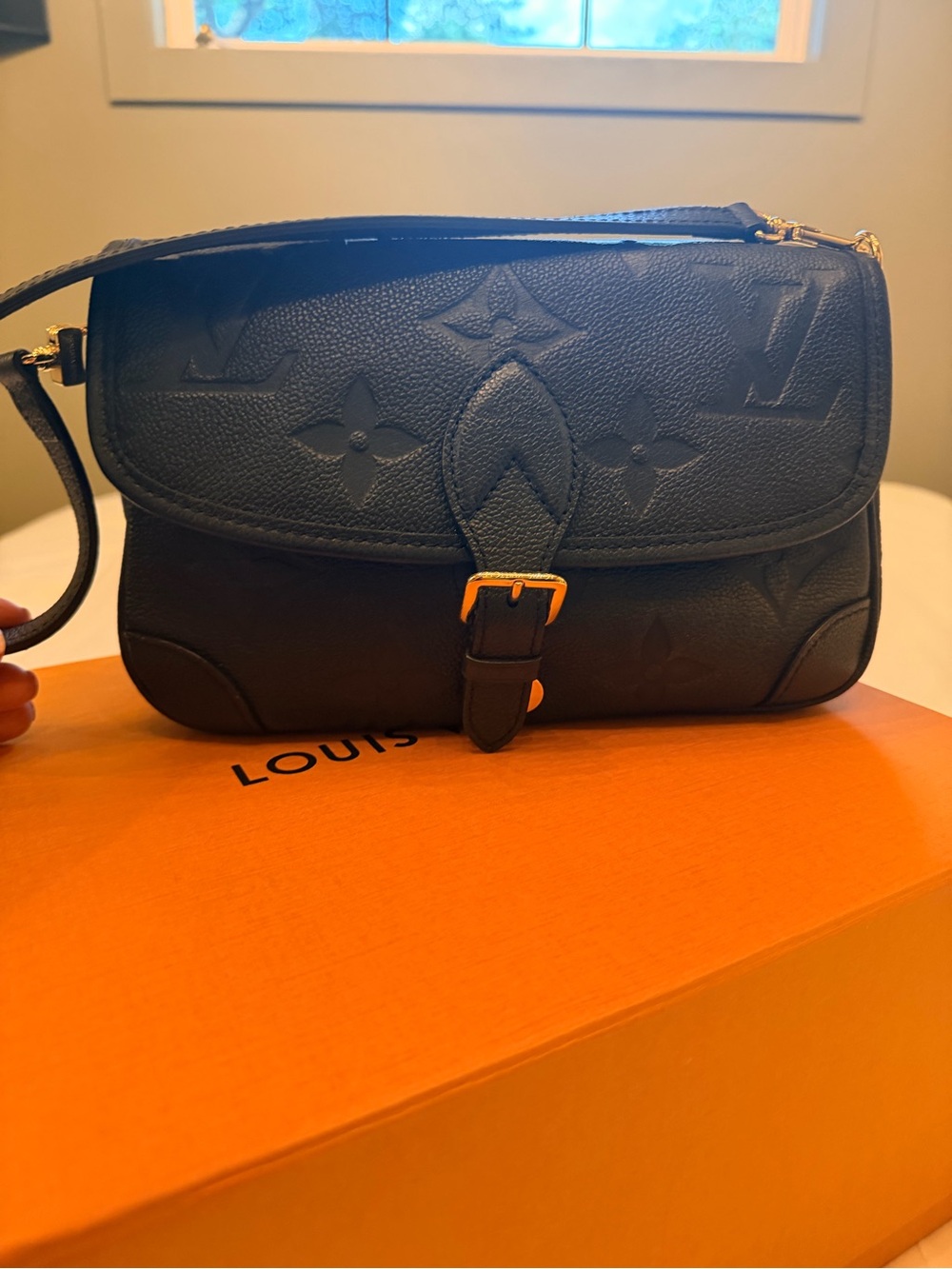 Louis Vuitton Diane in black Monogram Empreinte leather, M46386 purple inside ..
